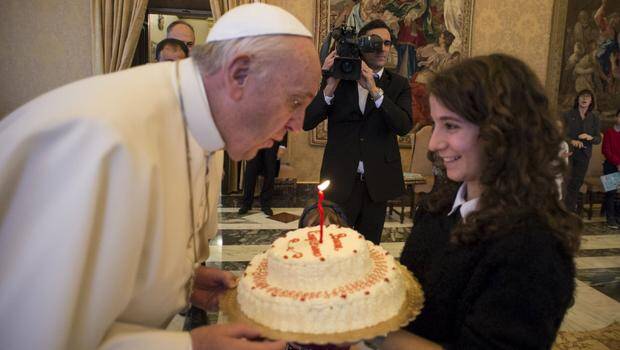 Pope Francis' 79th Birthday, and the Candle on his Cake (Courtesy of Reuters)
