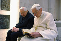 Pope Benedict XVI prays with his brother, Msgr. Georg Ratzinger in his private chapel at the Vatican April 14. (CNS photo/L'Osservatore Romano via Reuters) (April 14, 2012)