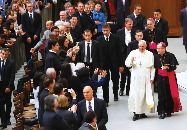REUNION. Pope Francis waves during a special audience with members of the Catholic Fraternity of Charismatic Covenant Communities and Fellowships at the Vatican, Oct. 31.