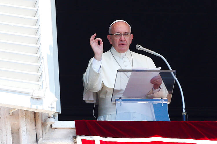 Pope Francis gestures during his Sunday Angelus prayer in Saint Peter's square at the Vatican on July 17, 2016. Photo courtesy of REUTERS/Tony Gentile