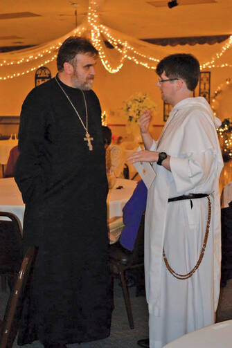 The Rev. Miron Kerul-Kmec and the author at St. Nicholas Byzantine Catholic Church in Barberton, Ohio.