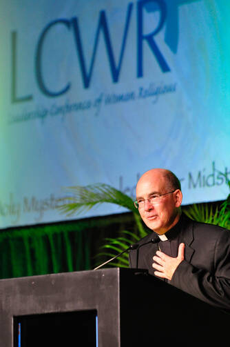 Achbishop J. Peter Sartain of Seattle attends a meeting of the Leadership Conference of Women Religious in Nashville, Tenn., last year. (CNS photo/Andy Telli, Tennessee Register)