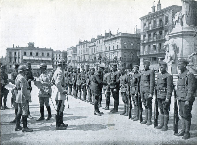 OVER THERE. Members of the 78th Division, including the author’s father (sixth from the right), receive awards in Bordeaux, France, May, 1919.