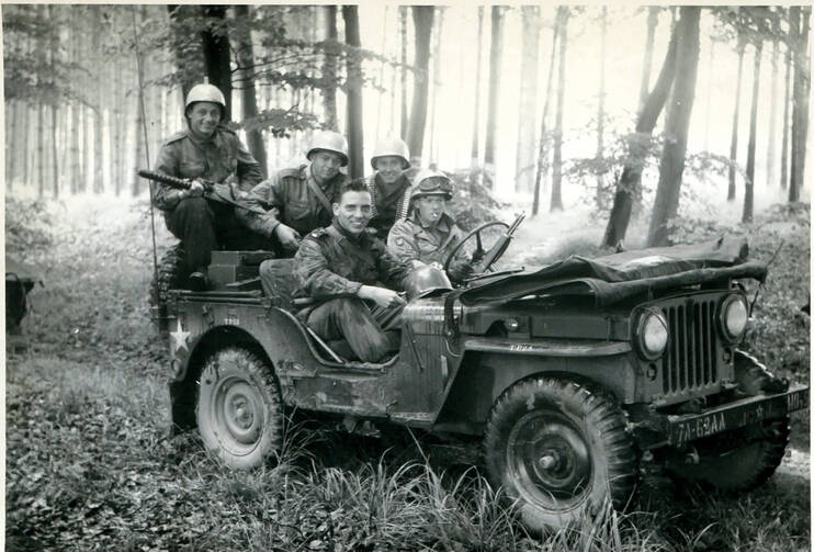 OVER THERE. The author, front left, with other members of the 62nd Anti-Aircraft Artillery Batallion during maneuvers near Mannheim, Germany.