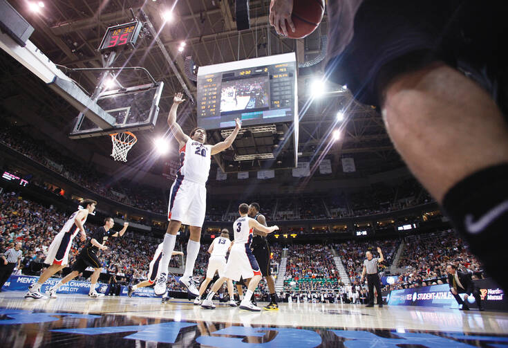 TEAMWORK. Gonzaga and Wichita State during an N.C.A.A. tournament basketball game on March 23, 2013