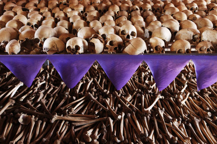 The skulls and bones of Rwandan victims rest on shelves at a genocide memorial inside a church at Ntarama, just outside the capital Kigali, 