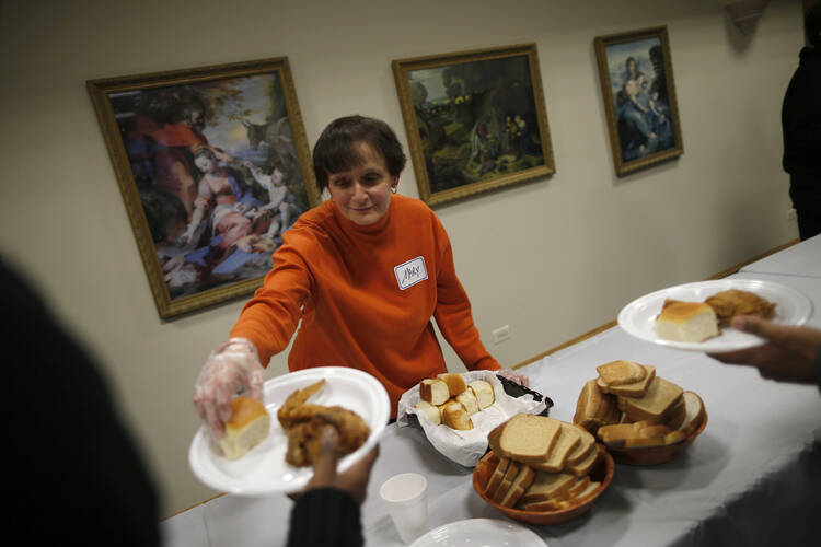 A free dinner service provided by Chicago Catholic Charities