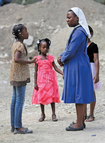 HELP AND HOPE. Sister Augusta Ernest, principal at St. Martin de Porres School in Hinche, Haiti.