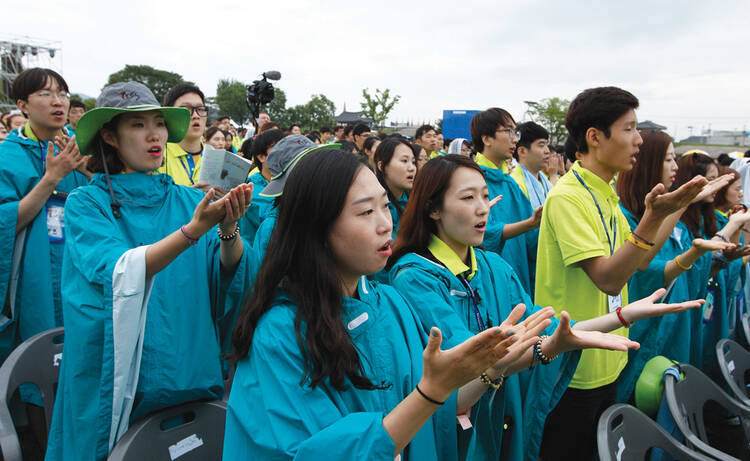 GENERATION NEXT. Young people join Pope Francis at the closing Mass of the sixth Asian Youth Day at Haemi Castle in Haemi, South Korea, on Aug. 17.