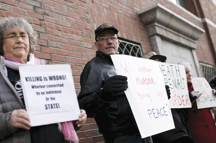 FINAL VERDICT? Protesters against the death penalty outside the federal courthouse in Boston before closing arguments on April 6 in the trial of accused Boston Marathon bomber Dzhokhar Tsarnaev.