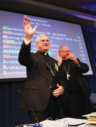 The Bishops' Choice: Archbishop Joseph Kurtz succeeds Cardinal Timothy M. Dolan, right.