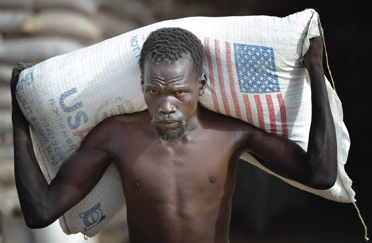 Farmed in the U.S.A: Grain arrives in South Sudan. International food assistance is just one component of the complex farm bill.