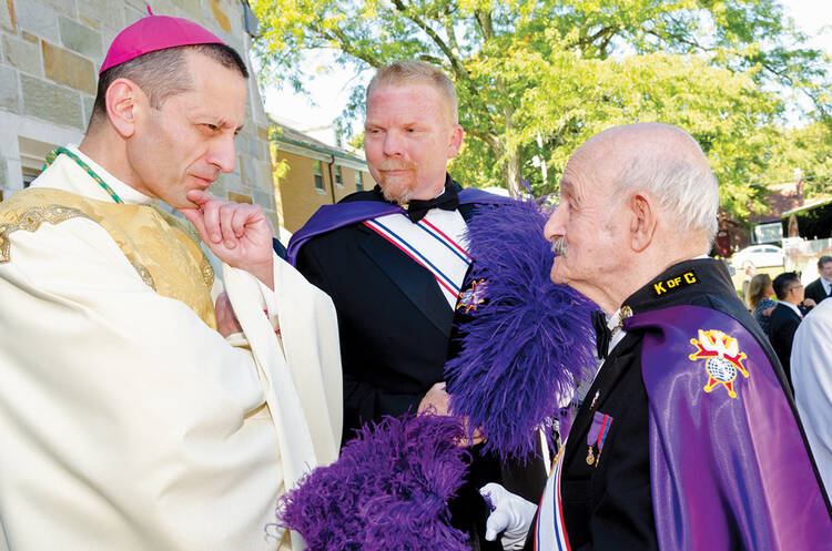 LISTENING SESSION. Bishop Frank J. Caggiano with Knights of Columbus.