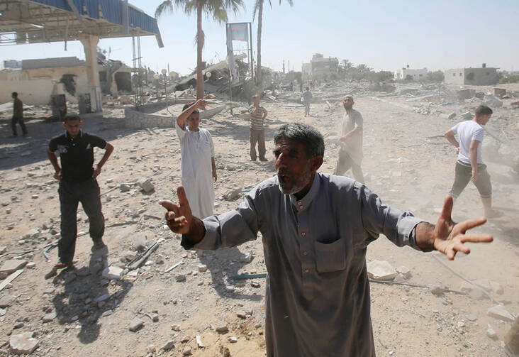 THE ANGUISH CONTINUES: Viewing the aftermath of Israeli shelling and airstrikes in Khan Younis, on the Gaza Strip on Aug. 1. 