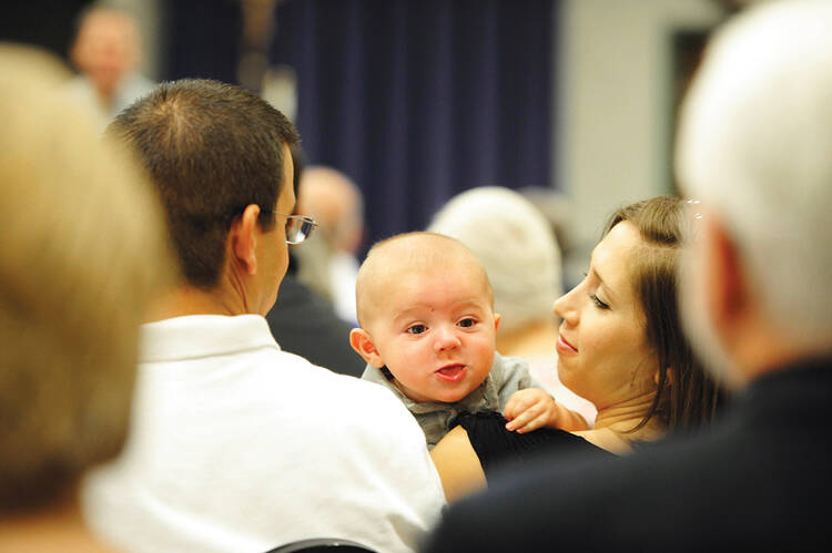 FAMILY GATHERING. A Pew study finds that U.S. Catholics have a high level of acceptance for "nontraditional" family arrangements.