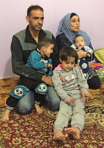 FAMILY PORTRAIT. Mouhammad Amin El Oujali with his wife, Zafira El Aquad, and their three children.