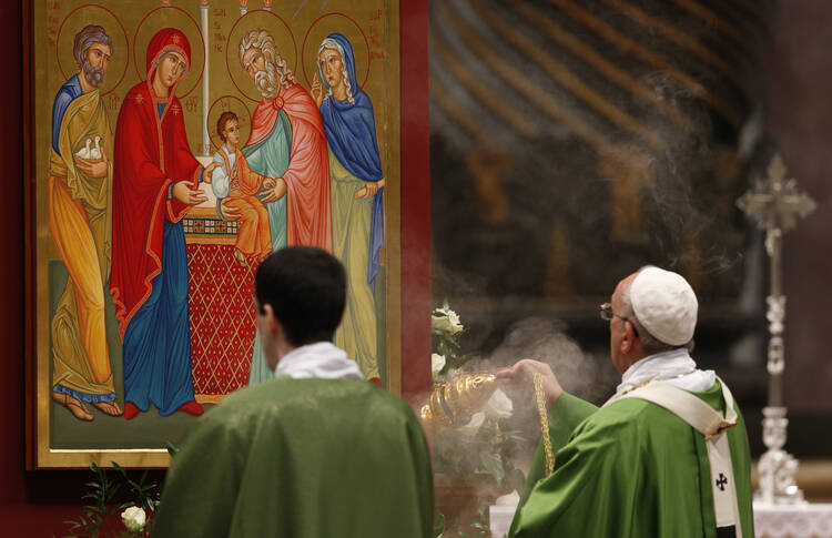 Pope Francis uses incense to venerate an icon of the Presentation of Jesus as he celebrates a Mass to open the extraordinary Synod of Bishops on the family in St. Peter's Basilica at the Vatican Oct. 5. (CNS photo/Paul Haring)