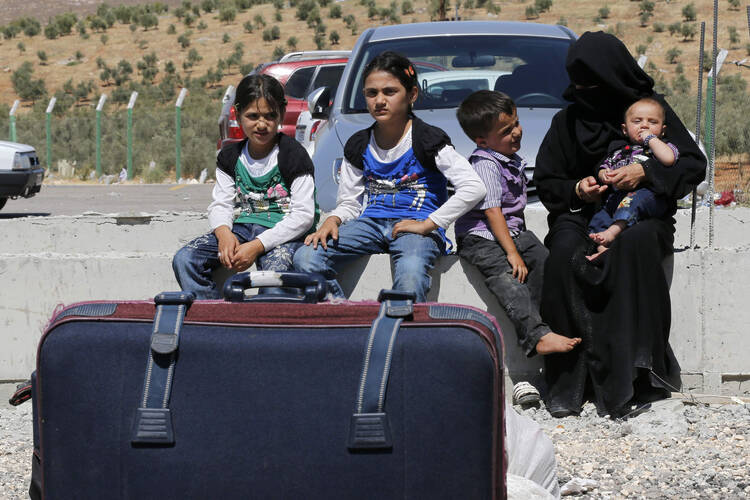 Syrian refugees at Turkey border crossing