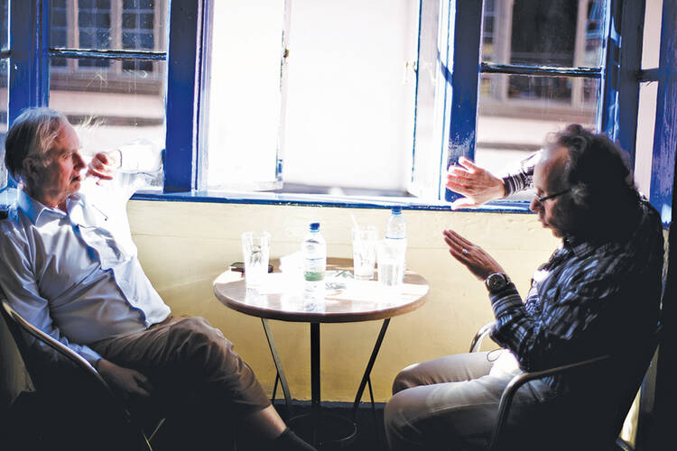 SALESMEN. Richard Dawkins, left, and Lawrence Krauss, in Oxford, England