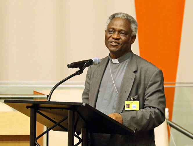 Cardinal Peter Turkson, president of the Pontifical Council for Justice and Peace, addresses the audience during a presentation on Pope Francis' encyclical on the environment June 30 at U.N. headquarters in New York City (CNS photo/Gregory A. Shemitz).