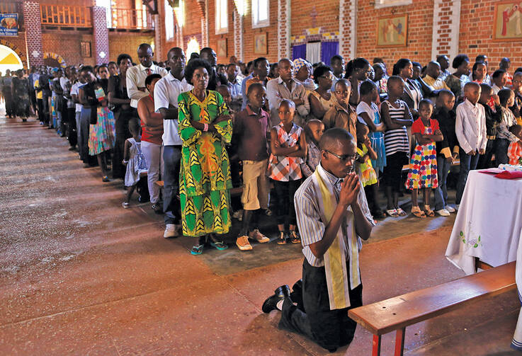 KEEPING THE FAITH. Mass at St. Famille Church in Kigali on April 6, 2014, one day before of the commemoration of the 20th anniversary of the Rwandan genocide. 