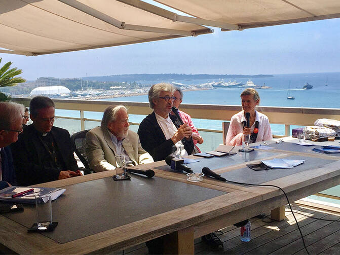 German director Wim Wenders, center, speaks during a panel discussion on May 25, 2017, in Cannes, France. RNS photo by A.J. Goldmann