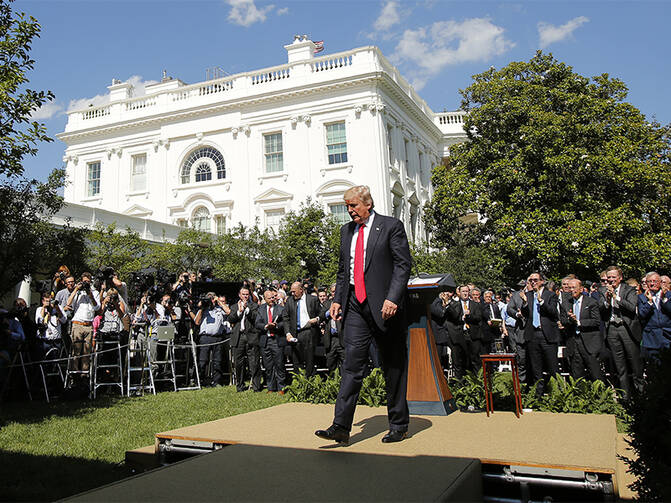 President Donald Trump departs after announcing his decision that the United States will withdraw from the landmark Paris Climate Agreement, in the Rose Garden of the White House in Washington, D.C., on June 1, 2017. Photo courtesy of Reuters/Kevin Lamarque