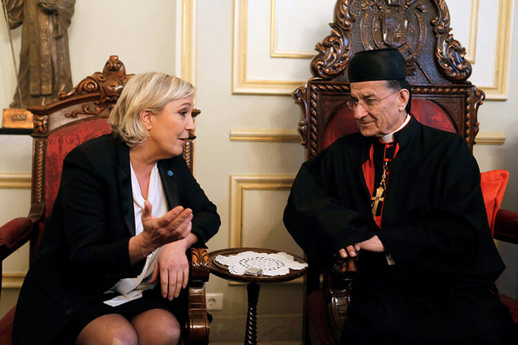 Marine Le Pen, French National Front (FN) political party leader and candidate for the French 2017 presidential elections, meets with Patriarch Bechara Boutros al-Rai in Bkerke, north of Beirut, Lebanon, on Feb. 21, 2017. Photo courtesy of Reuters/Mohamed Azakir
