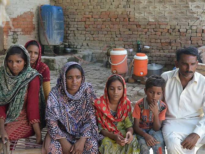 Family members of Sharoon Masih, a Christian high school student who was beaten to death on the third day of school in August in Pakistan. Photo courtesy of British Pakistani Christian Association