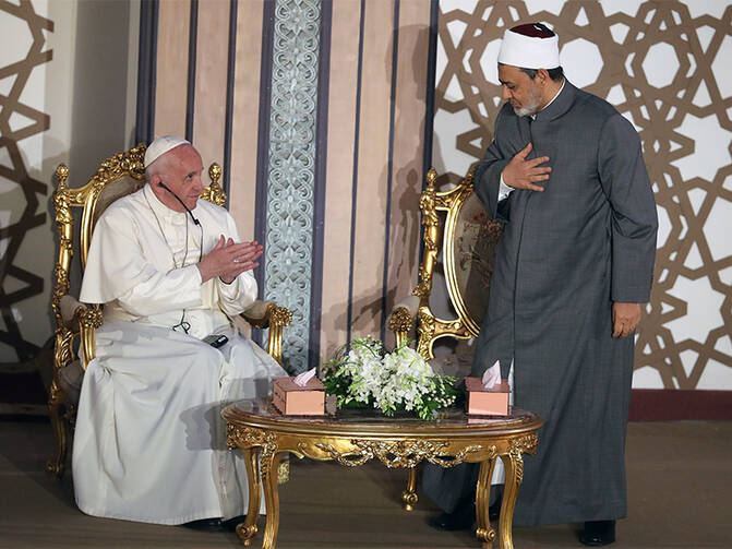 Pope Francis greets Al-Azhar's Grand Imam Ahmed al-Tayeb during a meeting in Cairo on April 28, 2017. Photo courtesy of Reuters/Mohamed Abd El-Ghany