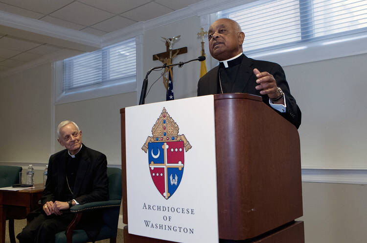 The archbishop designated by Pope Francis to the Archdiocese of Washington, Archbishop Wilton D. Gregory, speaks during a news conference as Cardinal Donald Wuerl looks on, at Washington Archdiocesan Pastoral Center in Hyattsville, Maryland, on April 4, 2019. (AP Photo/Jose Luis Magana)