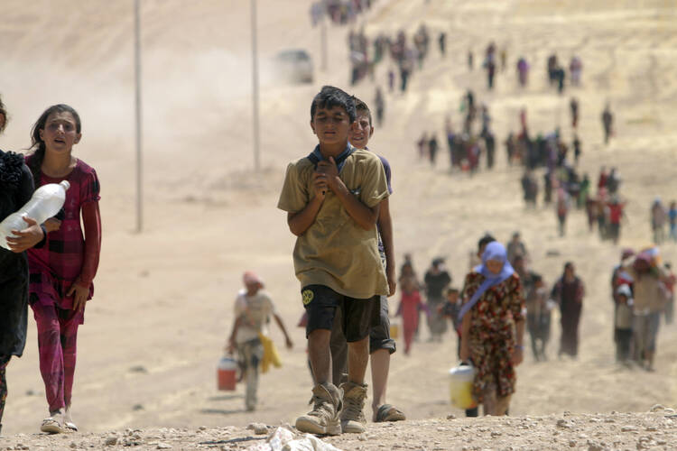Children in flight from ISIS in Sinjar, Iraq, Aug. 10, 2014. (CNS photo/Rodi Said, Reuters)