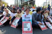 Sit-in in Seattle on April 15. Photo via SEIU Local 925.