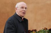 Cardinal Sean Brady of Armagh, Northern Ireland, arrives for the morning session of the general congregation meeting in the synod hall at the Vatican March 8. (CNS/Paul Haring)