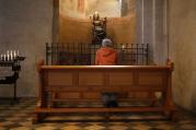 Woman kneels in prayer inside Limburg Cathedral (CNS photo/Kai Pfaffenbach, Reuters) 