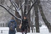 Students walk amid the snowfall on campus of Catholic University of America in Washington D.C. (CNS photo/Tyler Orsburn) (Dec. 10, 2013)