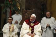 Pope Francis smiles during Mass at the Church of the Gesu in Rome Jan. 3. The Mass was celebrated on the feast of the Most Holy Name of Jesus in thanksgiving for the recent canonization of Jesuit St. Peter Faber. (CNS photo/Paul Haring) (Jan. 3, 2014) 