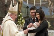 Pope Francis baptizes infant in Sistine Chapel at Vatican