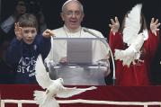 The two young people at Pope Francis' side launched doves to highlight the church's call for peace in the world. (CNS photo/Paul Haring)
