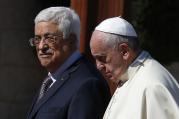 Pope Francis walks with Palestinian President Mahmoud Abbas during arrival ceremony at presidential palace in Bethlehem. (CNS photo/Paul Haring)