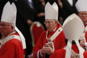 Archbishop Leonard P. Blair of Hartford, Conn., center, wears his new pallium as he leaves in procession at the conclusion of a Mass celebrated by Pope Francis to mark the feast of Sts. Peter and Paul in St. Peter's Basilica at the Vatican June 29.