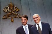 Jean-Baptise de Franssu, new president of Vatican bank, and outgoing president Ernst Von Freyberg pose during news conference. (CNS photo/Tony Gentile, Reuters)