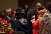 Michael Brown's mother is comforted during his funeral in St. Louis. (CNS photo/Robert Cohen, pool via EPA)