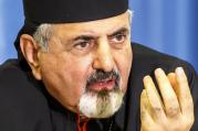 Syriac Catholic Patriarch Ignace Joseph III Younan gestures during a press conference on the human rights situation of Christians in Iraq and Syria at the European headquarters of the United Nations in Geneva Sept. 16. (CNS photo/Salvatore di Nolfi, EPA)