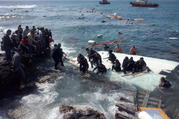 Migrants arrive at Zefyros beach near the coast of the southeastern island of Rhodes, Greece, April 20, 2015. At least three people drowned the day after Pope Francis appealed for the international community to do more to prevent such migrant deaths. (CNS photo/Loukas Mastis, EPA)