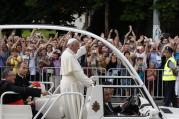 Pope Francis greets crowd as he arrives for meeting with young people in Sarajevo, Bosnia-Herzegovina.