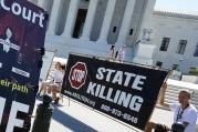 Protesters against the death penalty gather in front of the U.S. Supreme Court building in Washington June 29. (CNS photo/Jonathan Ernst, Reuters)