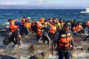 Migrants from Syria arrive on the Greek island of Lesbos Oct. 2 after crossing the Aegean Sea from Turkey. (CNS photo/Dale Gavlak) 