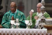 Pope Francis celebrates the Eucharist during the closing Mass of the Synod of Bishops on the family in St. Peter's Basilica at the Vatican Oct. 25. Concelebrating is Cardinal Wilfrid Napier of Durban, South Africa. (CNS photo/Paul Haring) 