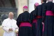 Pope Francis smiles as he greets prelates during his weekly audience in St. Peter's Square at the Vatican Oct. 28. (CNS photo/Stefano Rellandini, Reuters)